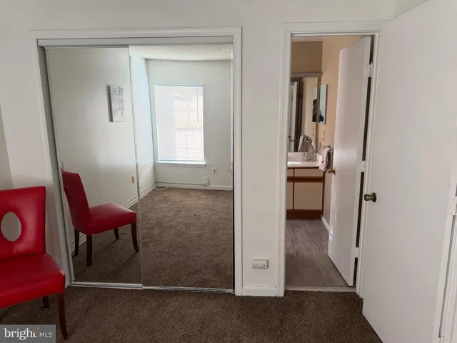 a bathroom with a double vanity sink toilet and shower