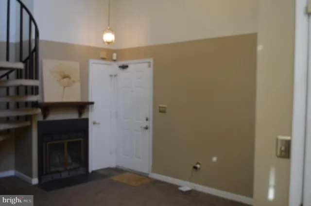 a bathroom with a shower and a mirror