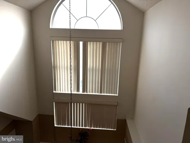 a view of entryway with a front door