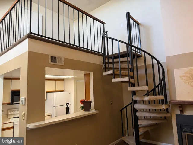 a view of a door and chair in a room