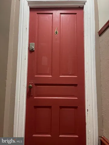 a picture of a wall with a white wall and a painting