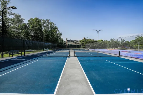 a view of swimming pool with a patio