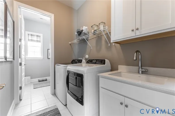 a view of bathroom with dual sinks
