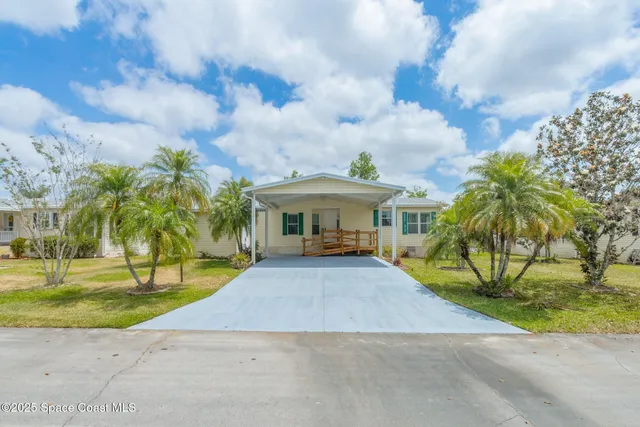 a view of house with outdoor space and entertaining space