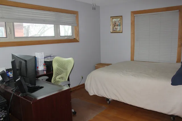 a bathroom with a sink a mirror and a shower