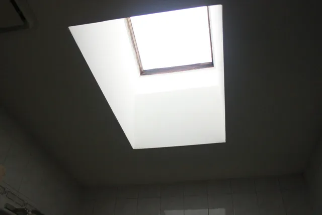 a living room with a couch and a table