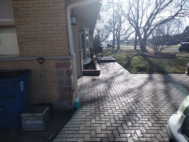 a view of a patio with a yard