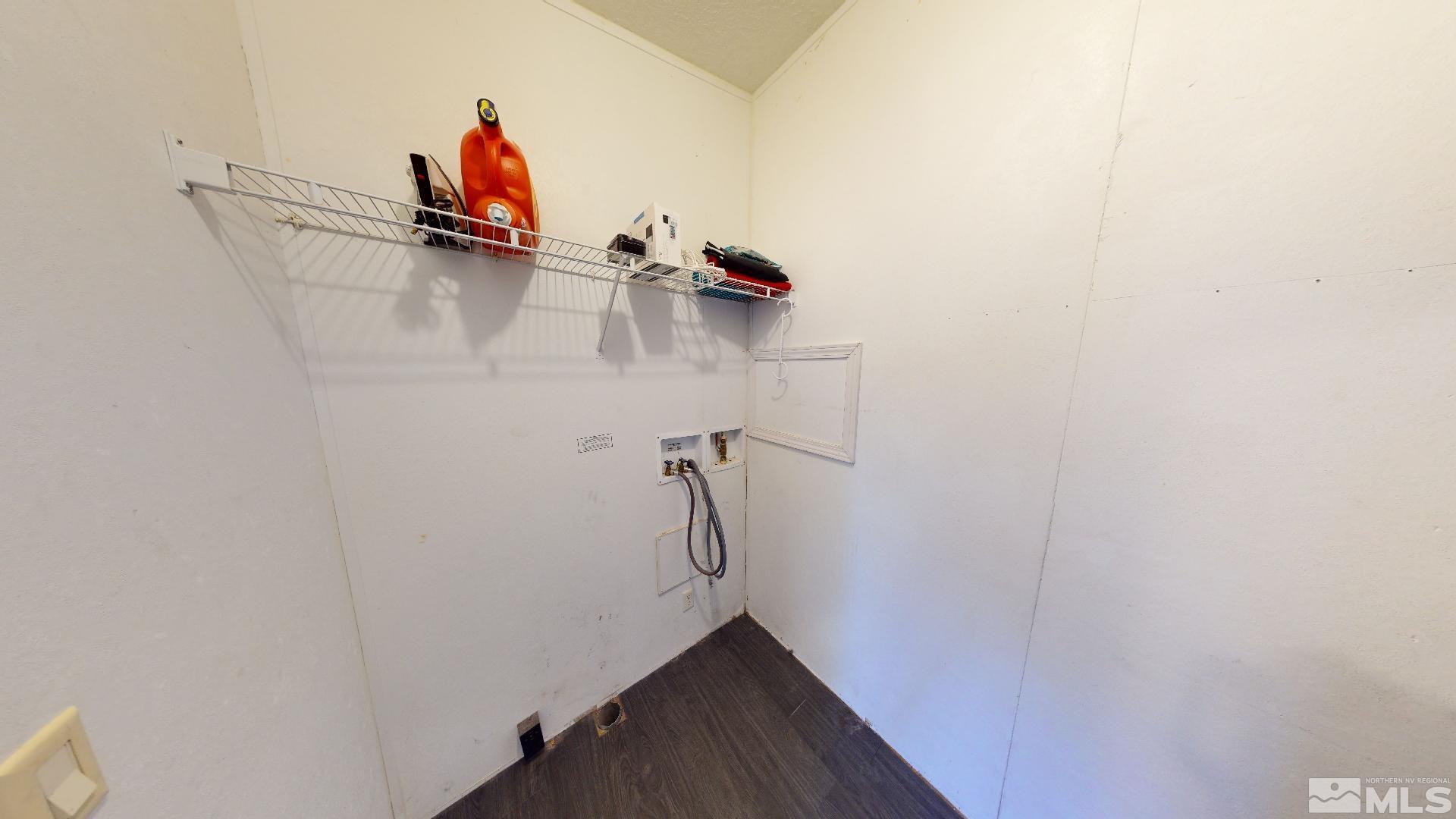 230 Danforth Drive Sun Valley, NV 89433 - Photo 16 of 28 a view of walk in closet with clothes and shoes