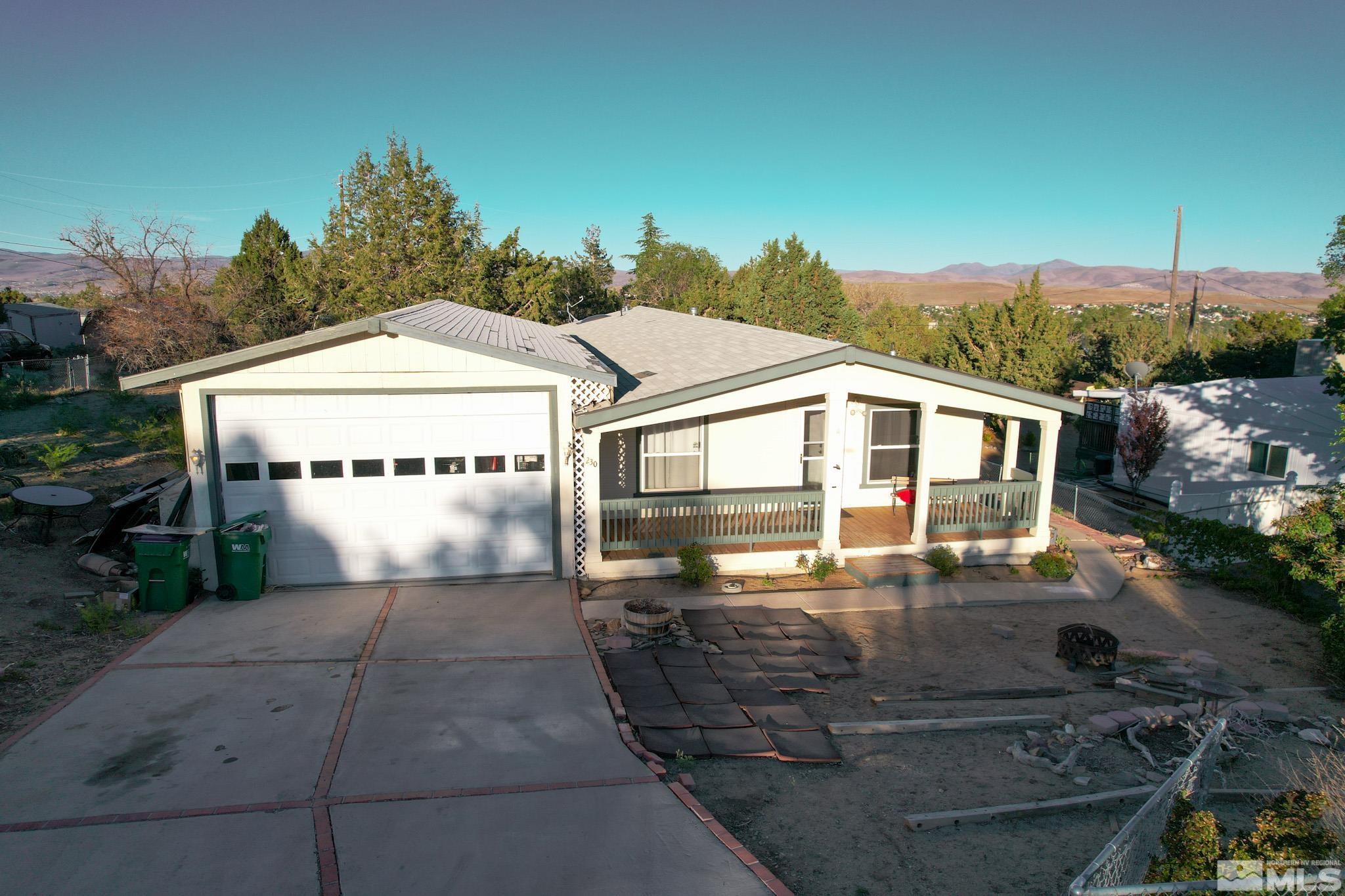 230 Danforth Drive Sun Valley, NV 89433 - Photo 2 of 28 an aerial view of a house with a yard