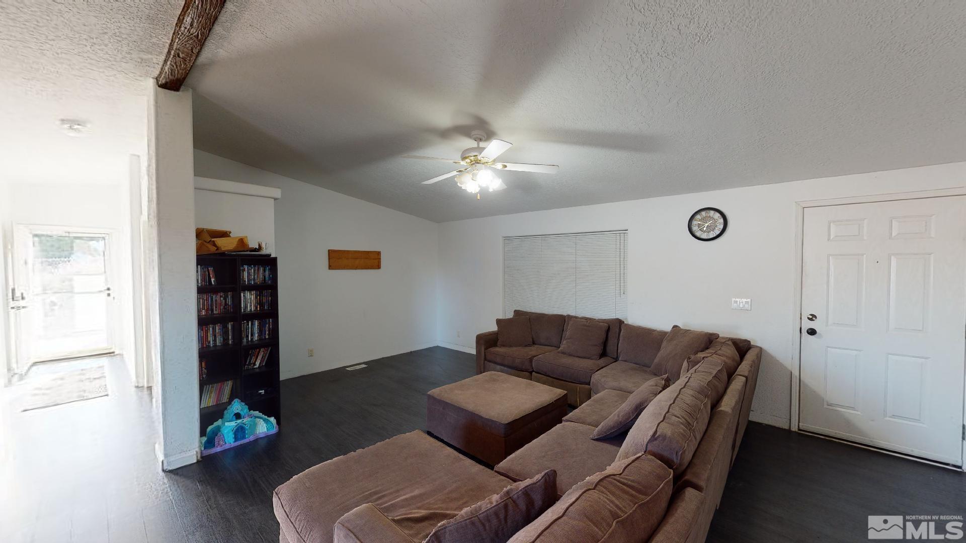230 Danforth Drive Sun Valley, NV 89433 - Photo 6 of 28 a living room with furniture and wooden floor