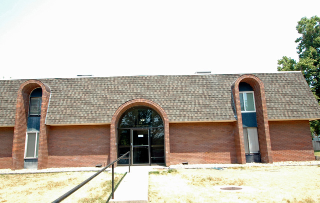 46 Lester Avenue, Unit G 24 Murray, UT 84107 - Photo 1 of 16 Brick exterior featuring a gabled roof and arched entryways