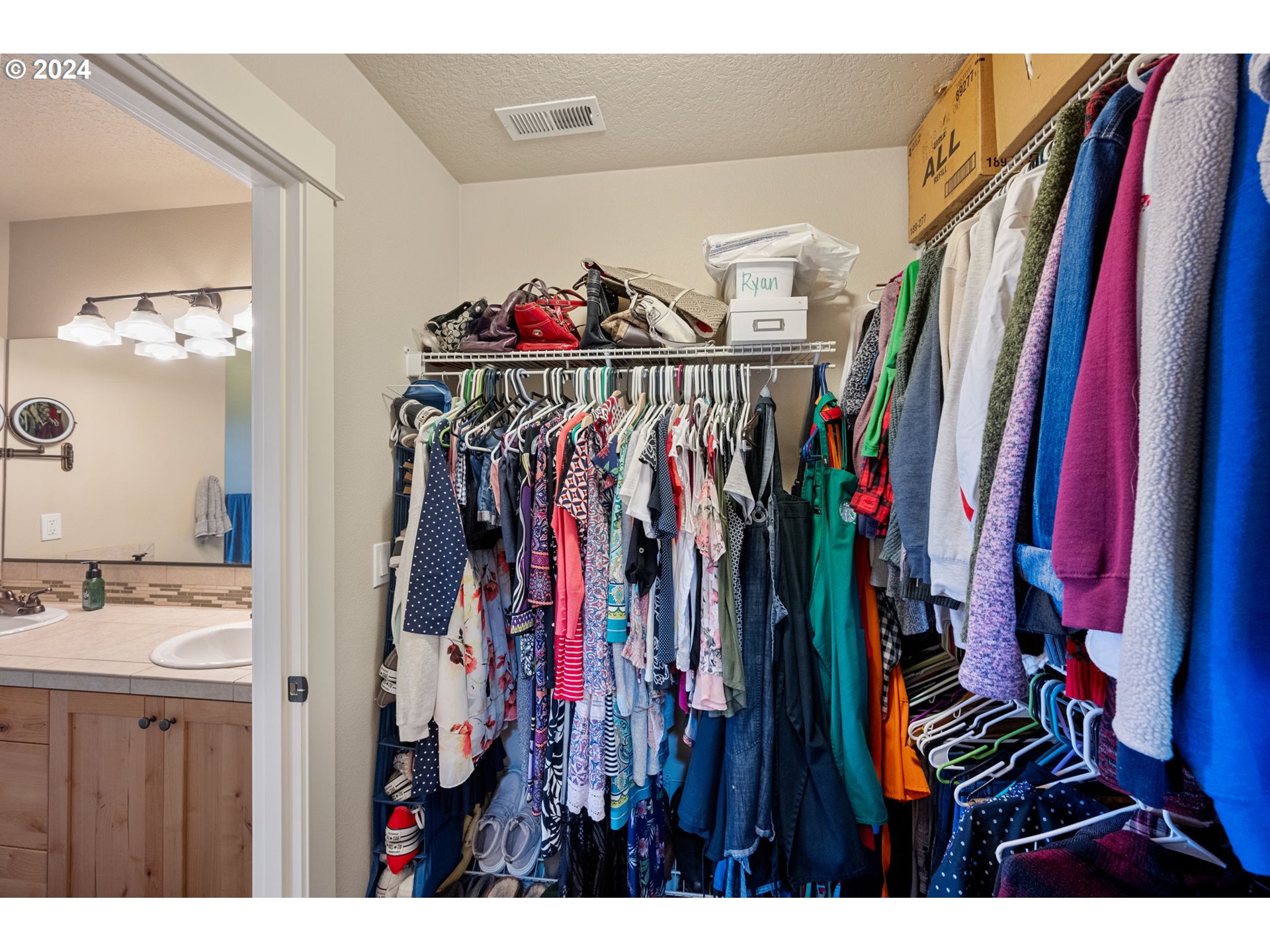 18438 Shadow Ridge Way Oregon City, OR 97045 - Photo 21 of 38 a view of walk in closet with clothes