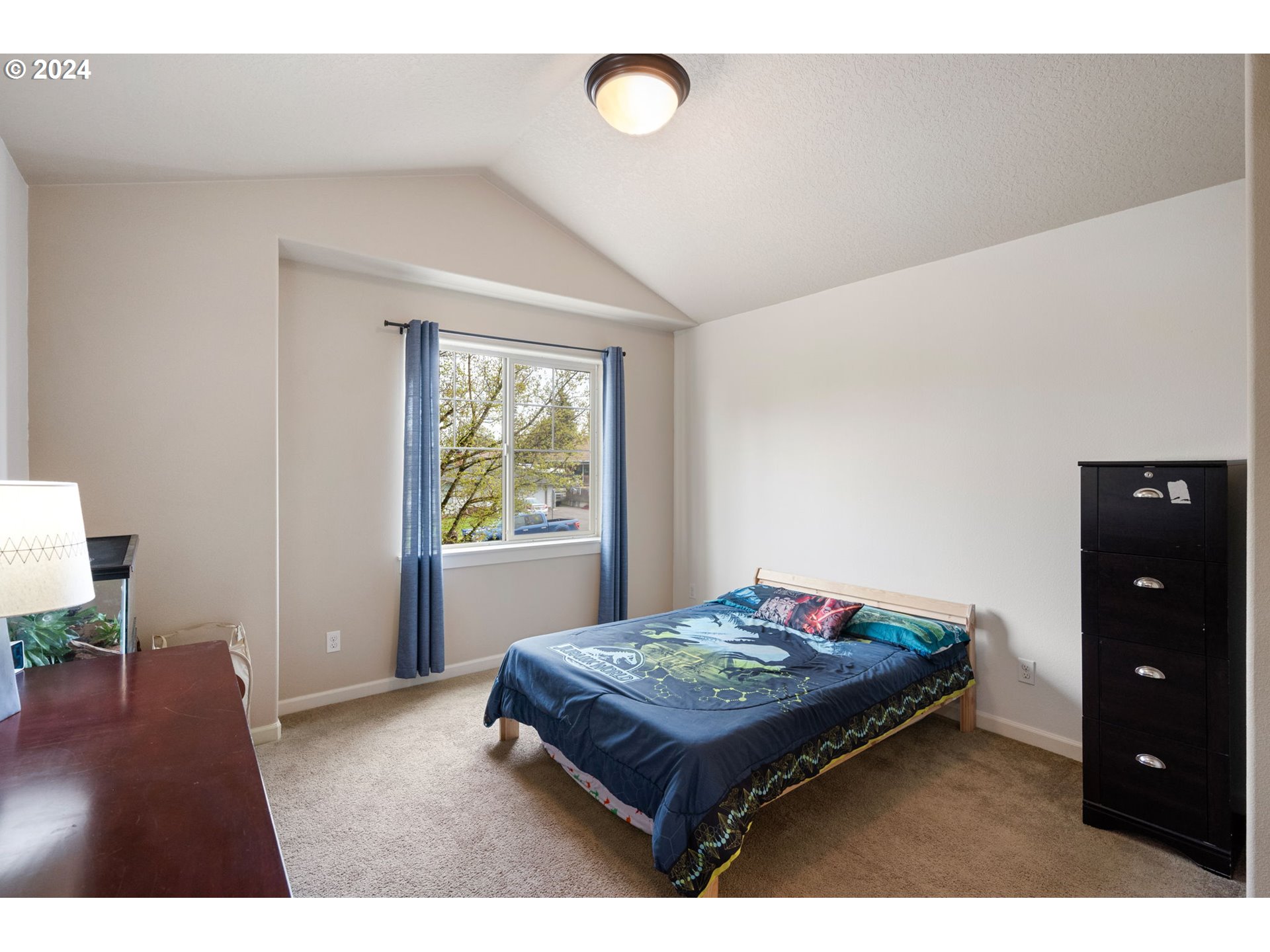 18438 Shadow Ridge Way Oregon City, OR 97045 - Photo 23 of 38 a bedroom with a bed window and a table