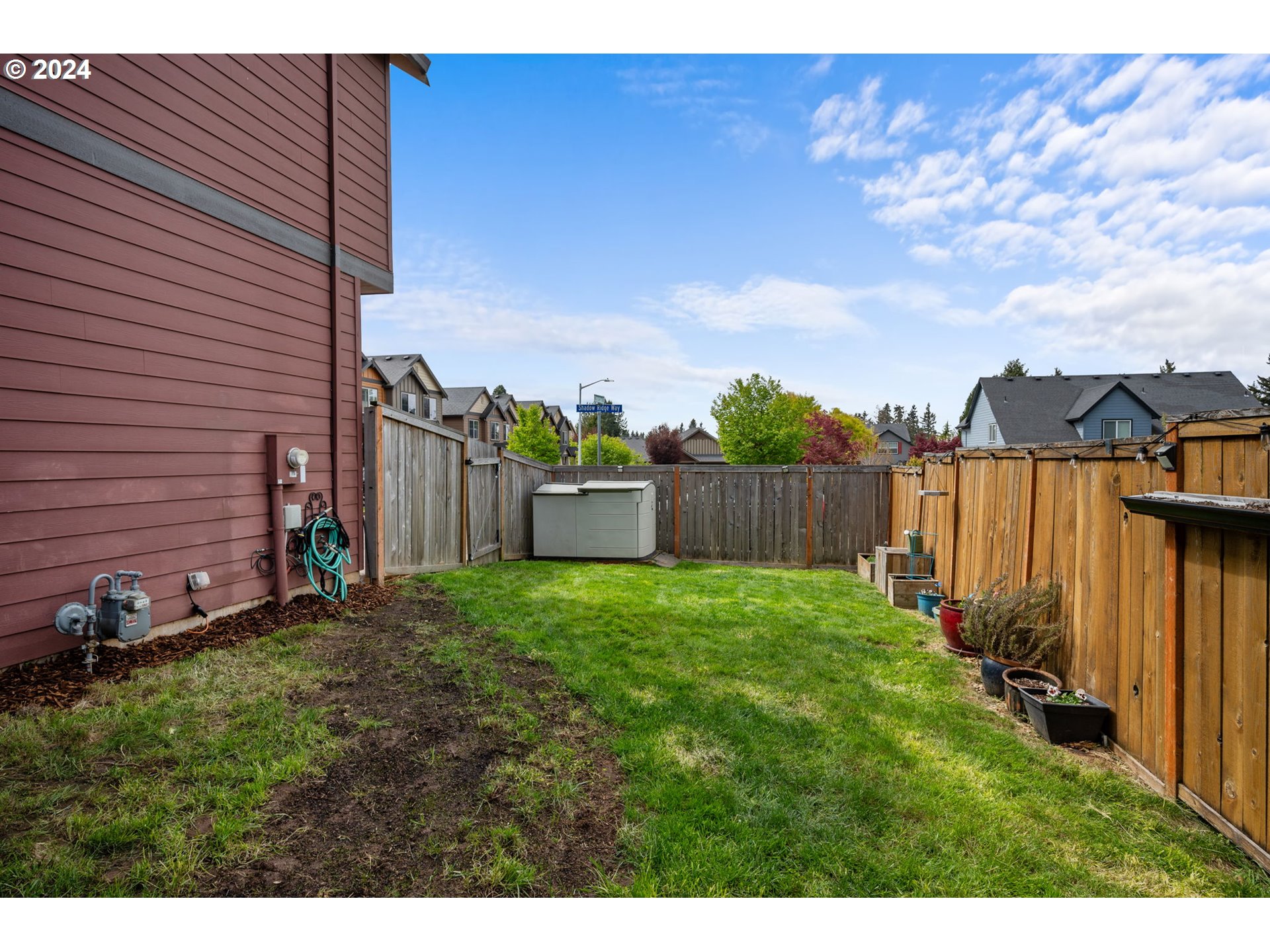 18438 Shadow Ridge Way Oregon City, OR 97045 - Photo 31 of 38 a view of a backyard with wooden fence