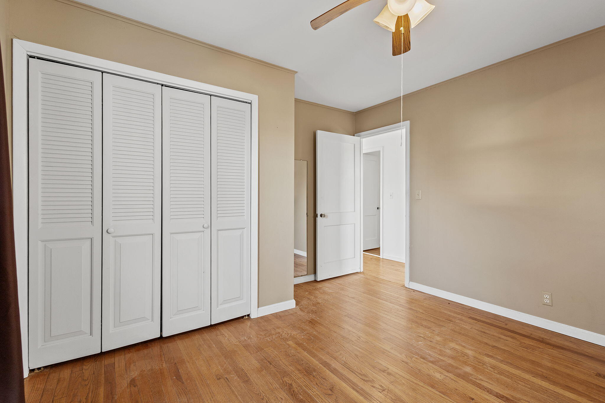 522 West Parks Drive Rensselaer, IN 47978 - Photo 21 of 29 a view of an empty room with wooden floor