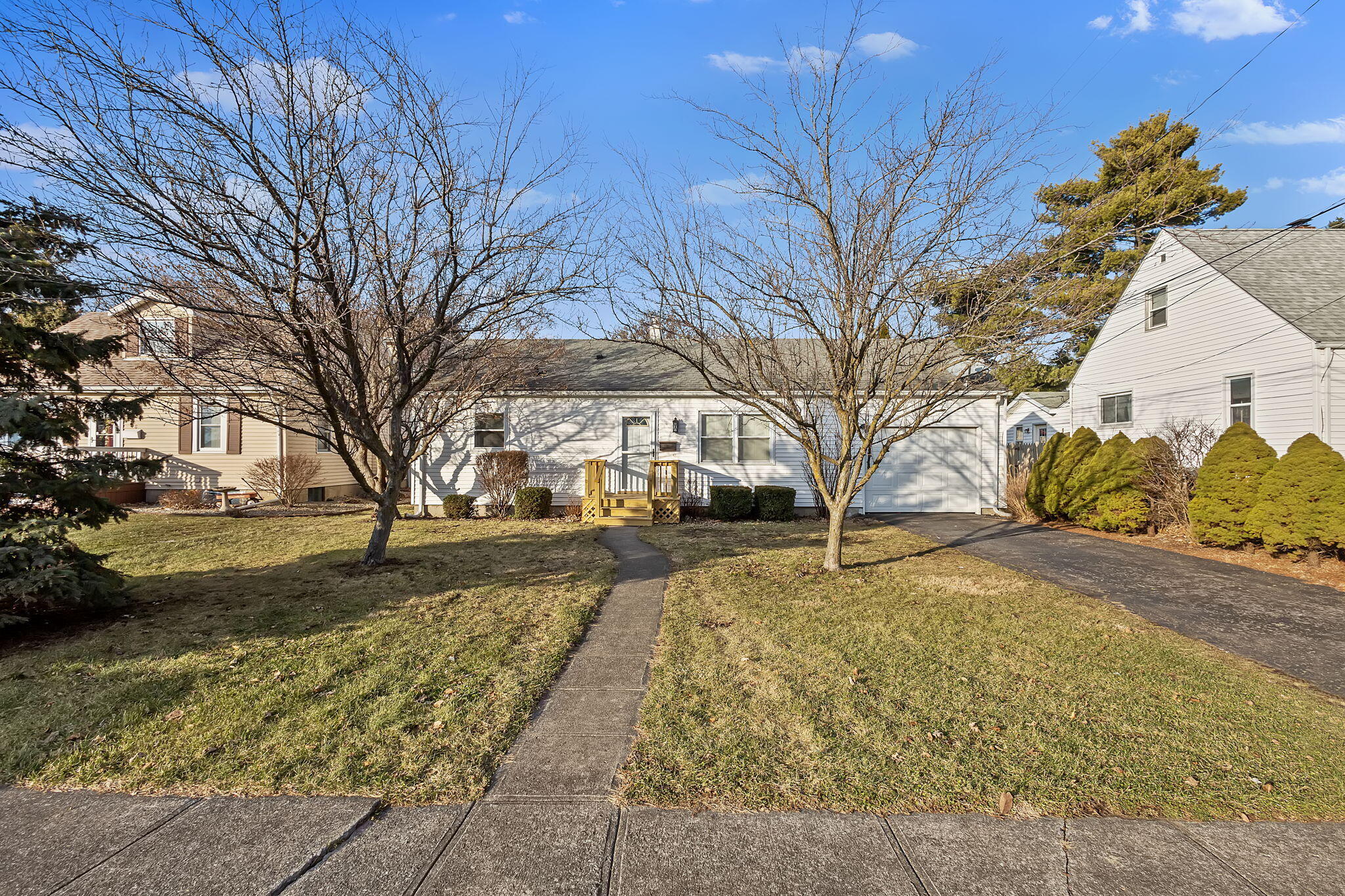 522 West Parks Drive Rensselaer, IN 47978 - Photo 5 of 29 a house with trees in front of it