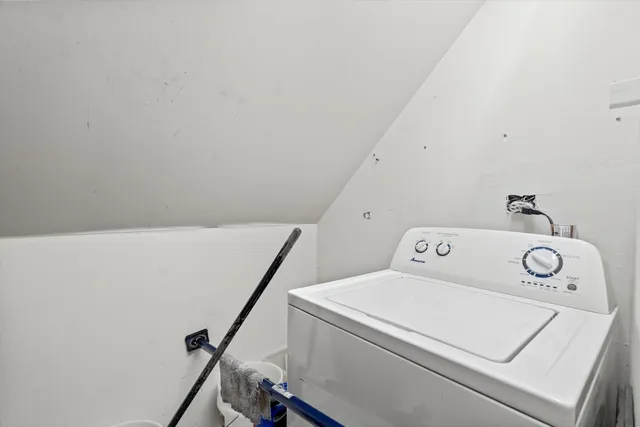 a wooden fence with trees in the background