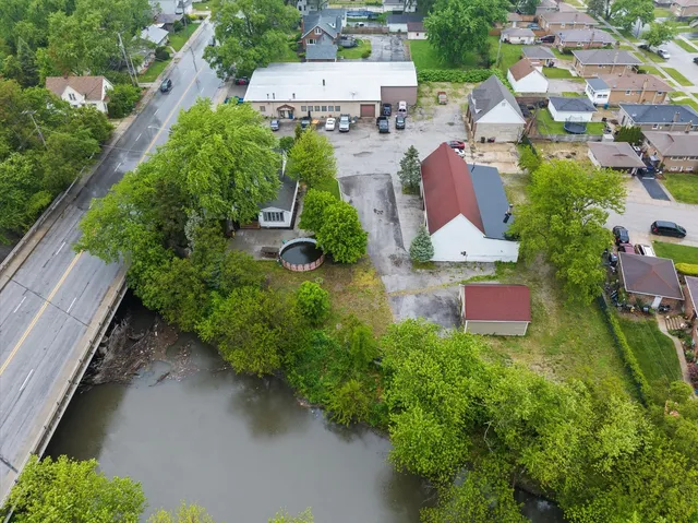 an aerial view of a house with a garden