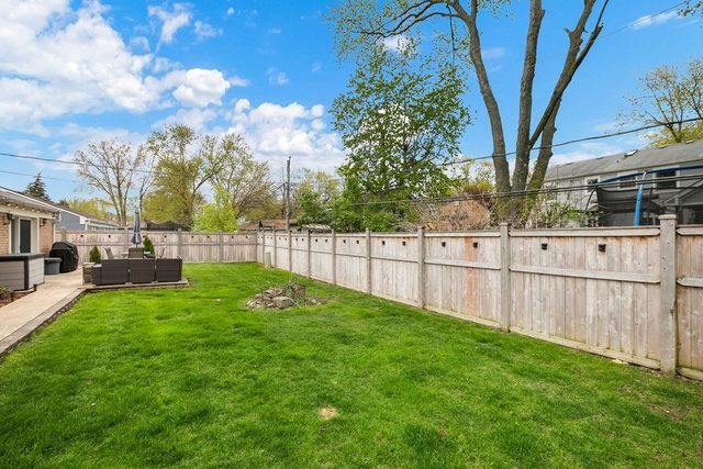 172 Oxford Road Bolingbrook, IL 60440 - Photo 21 of 27 a view of yard with large trees and a big yard