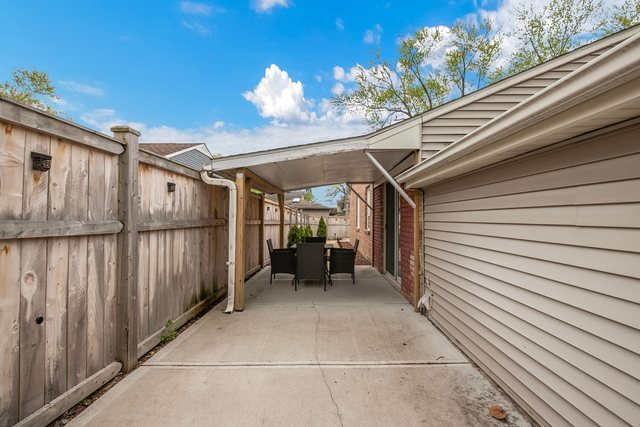 172 Oxford Road Bolingbrook, IL 60440 - Photo 26 of 27 a view of a porch with furniture