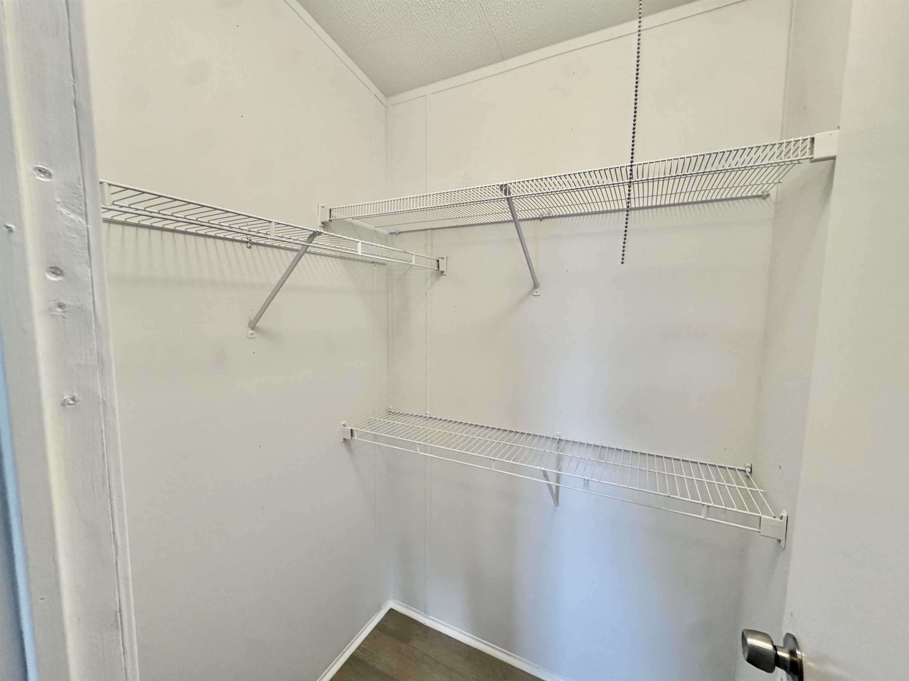 3178 Portersville Road Atoka, TN 38004 - Photo 17 of 31 a view of a room with racks on the wall