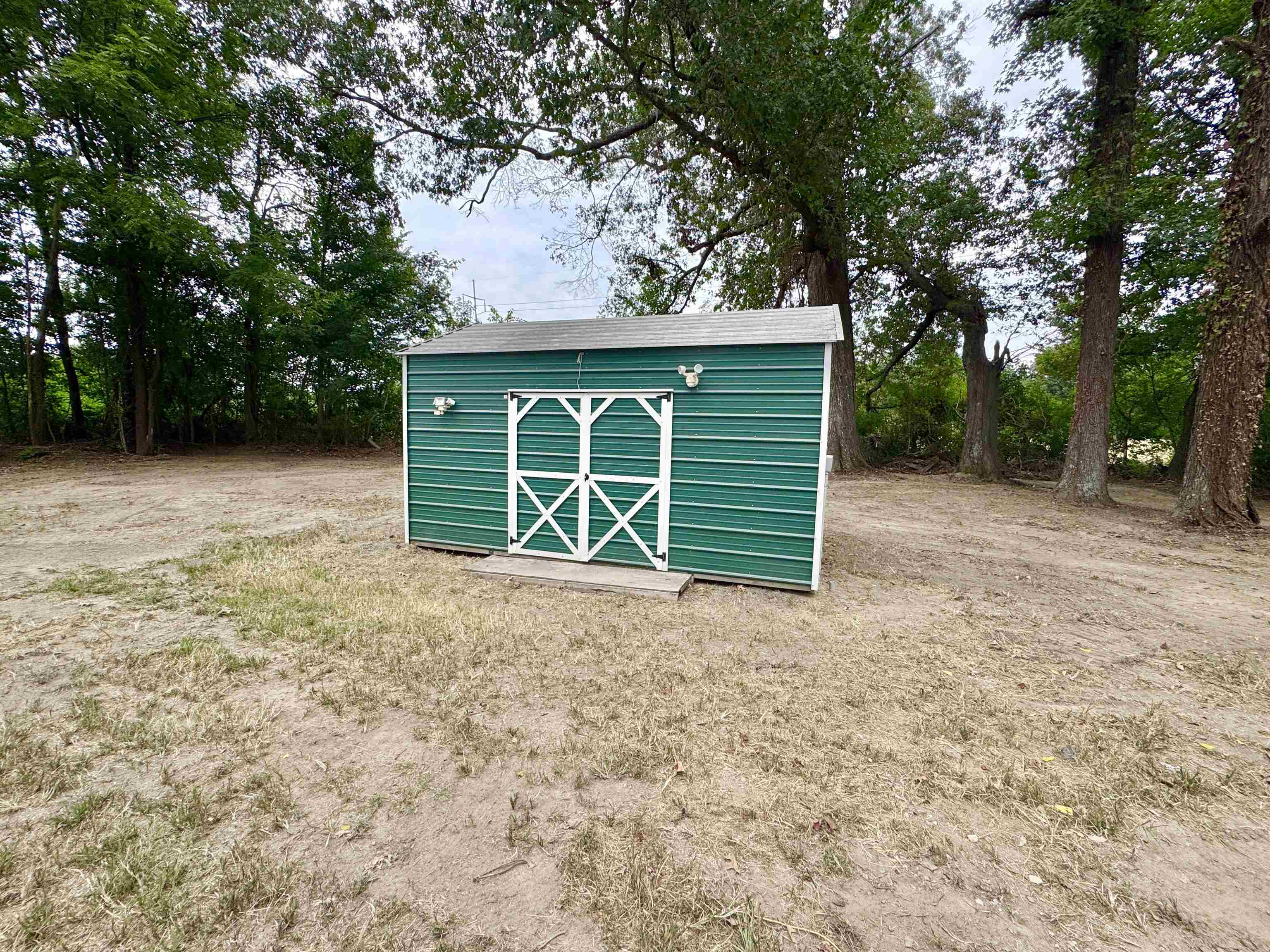3178 Portersville Road Atoka, TN 38004 - Photo 26 of 31 a view of a house with a backyard