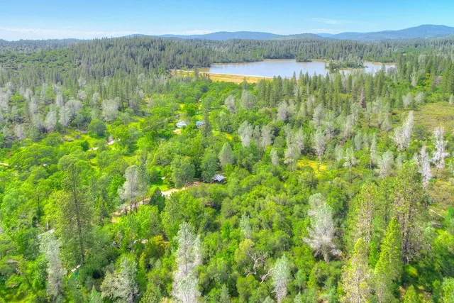 a view of lake with green space