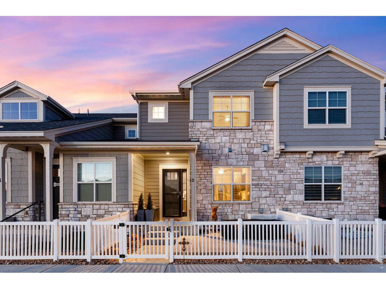5221 Longshaw Court, Unit 2 Windsor, CO 80528 - Photo 2 of 41 South facing entrance with guest parking on the street