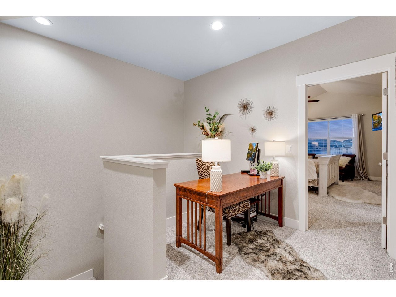 5221 Longshaw Court, Unit 2 Windsor, CO 80528 - Photo 22 of 41 Upstair loft area between bedrooms
