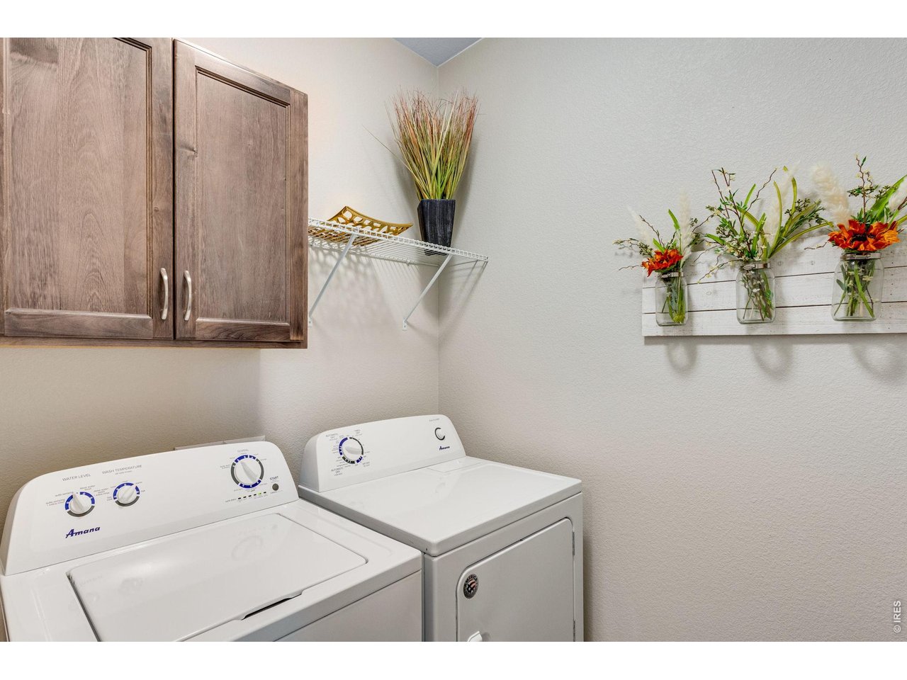 5221 Longshaw Court, Unit 2 Windsor, CO 80528 - Photo 33 of 41 Upstair laundry close to bedrooms