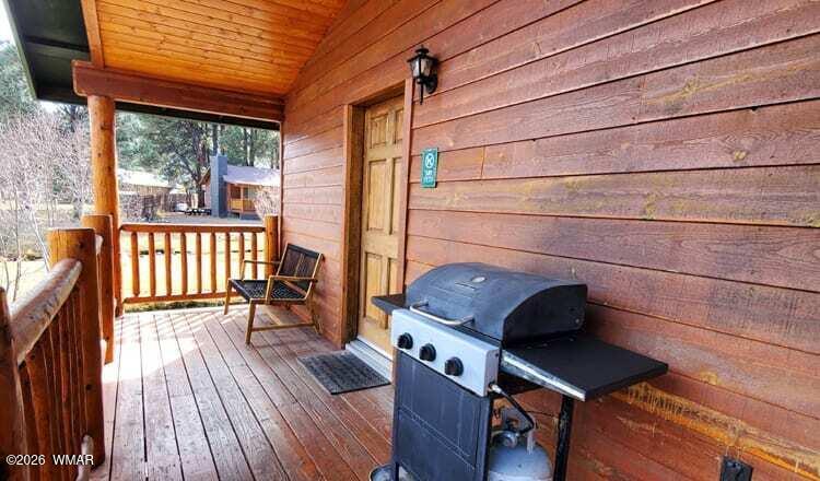 97 Rohrer Road Greer, AZ 85927 - Photo 5 of 14 a view of a chairs in a balcony