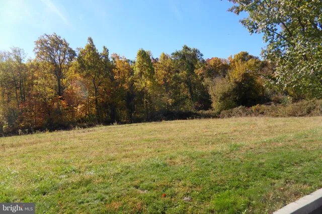 a view of a playground with basketball court