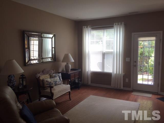 2838 Casona Way Raleigh, NC 27616 - Photo 3 of 20 a living room with furniture and a window