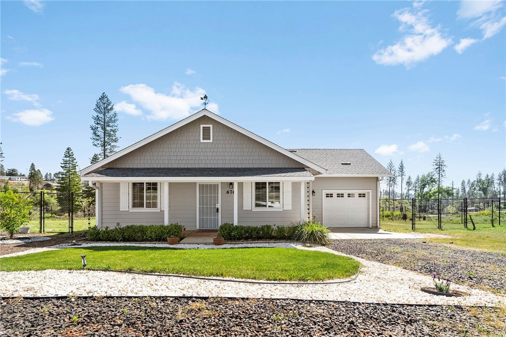 676 Edwards Lane Paradise, CA 95969 - Photo 1 of 1 a front view of a house with a yard