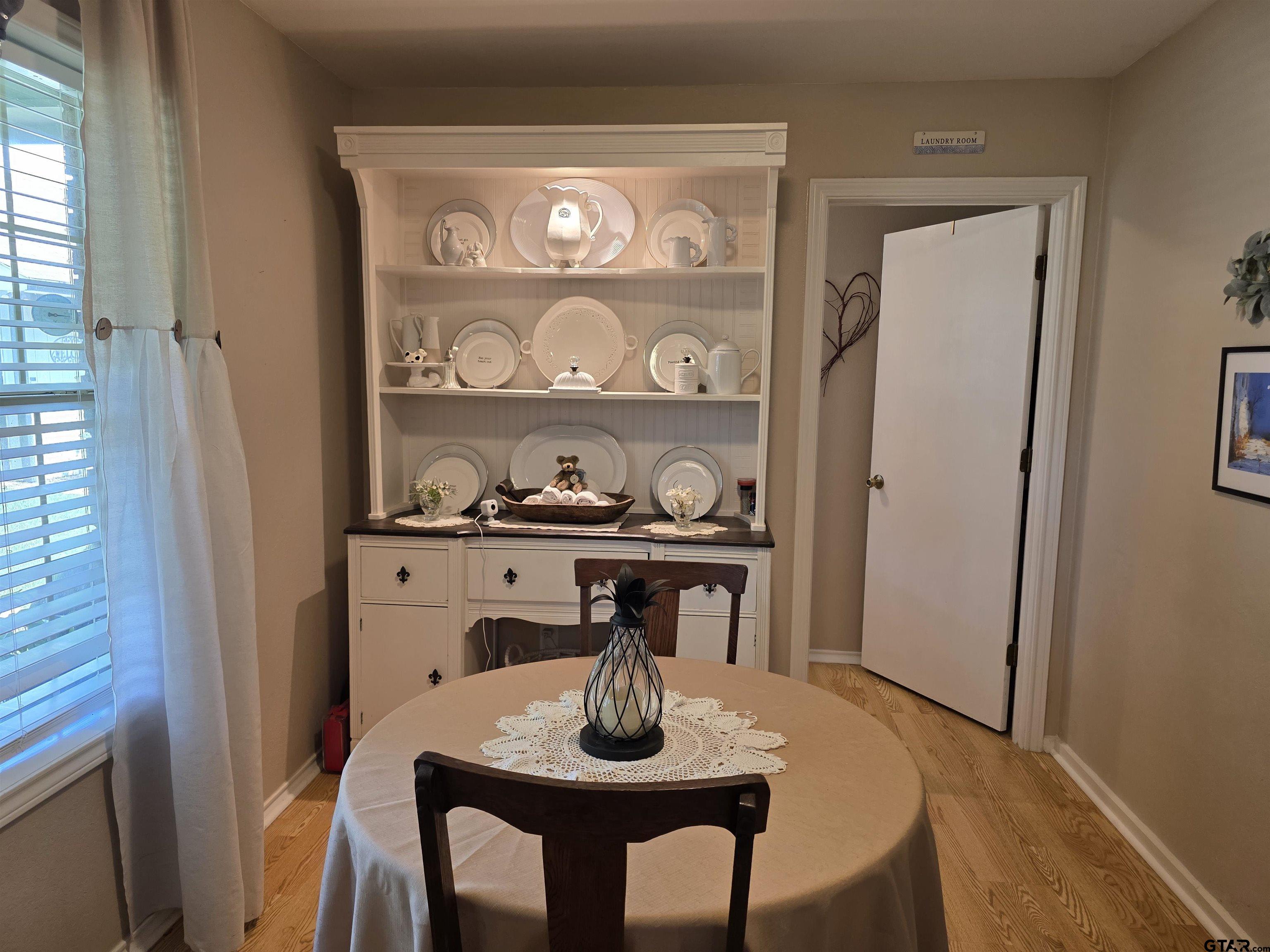 6170 Highway 271 Mount Pleasant, TX 75455 - Photo 19 of 43 a table that has a table and chairs in it