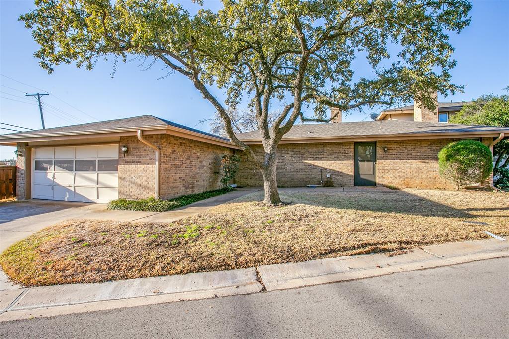 Looking strait onto Front Door and Garage