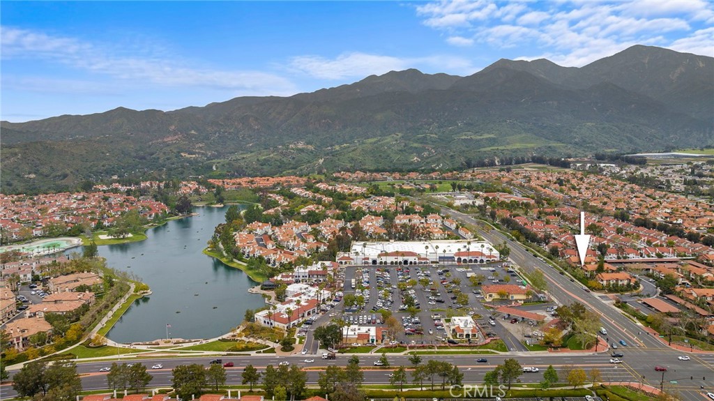 21 Rosa, Unit 132 Rancho Santa Margarita, CA 92688 - Photo 1 of 1 an aerial view of residential houses with outdoor space and river