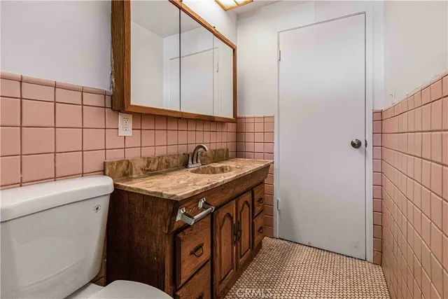 a utility room with a sink a washer and dryer
