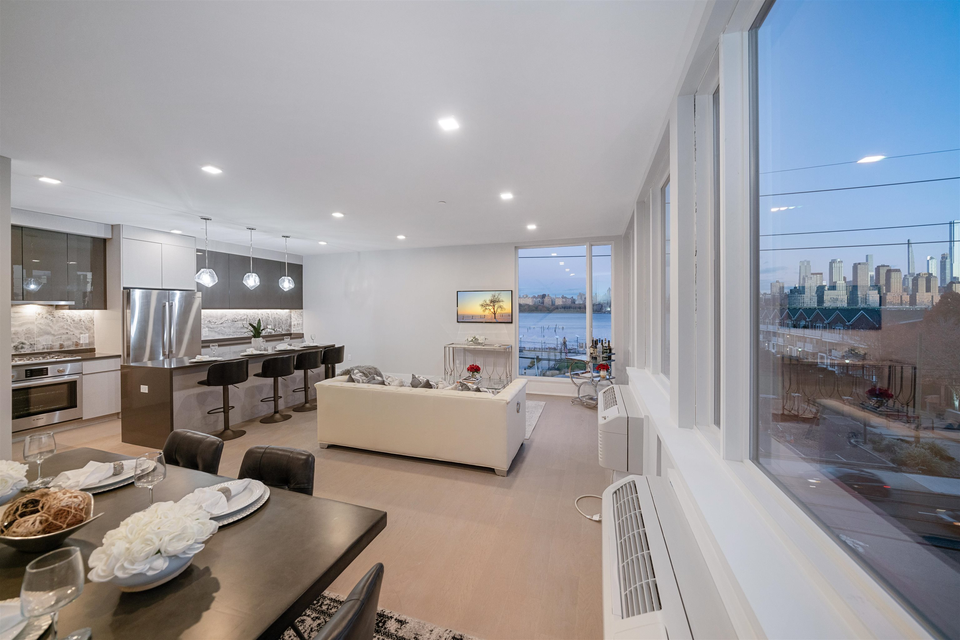 a living room with furniture and a table