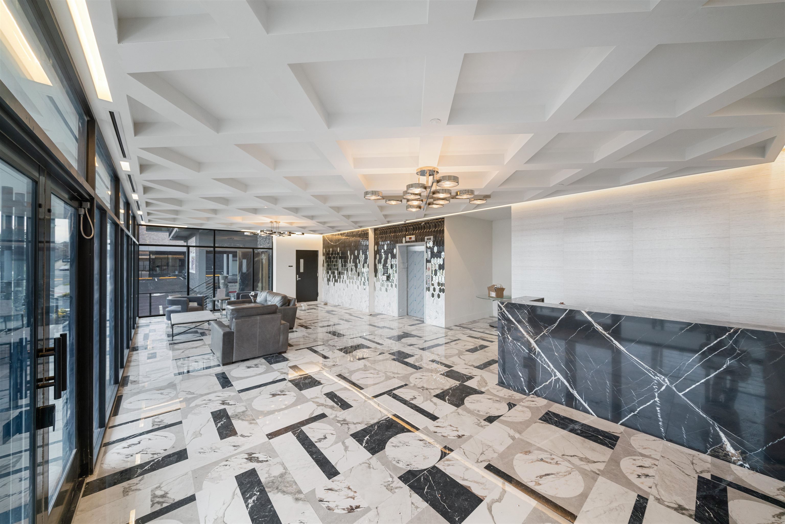 7101 River Road, Unit 202B North Bergen, NJ 07047 - Photo 19 of 26 a view of a dining room with furniture wooden floor and chandelier