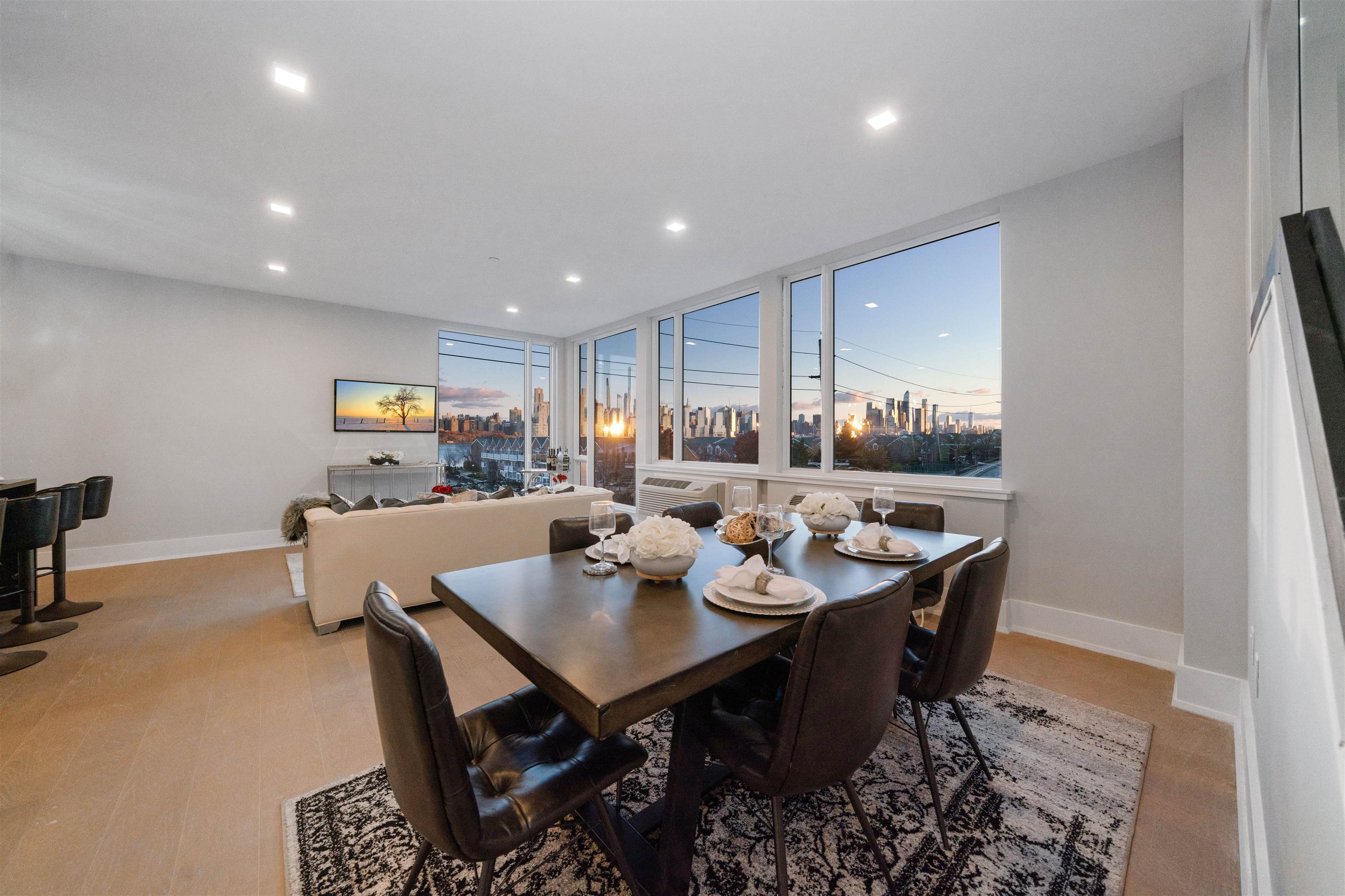 7101 River Road, Unit 202B North Bergen, NJ 07047 - Photo 4 of 26 a view of a dining area with furniture