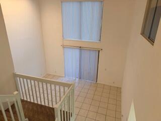 7473 Champagne Place Boca Raton, FL 33433 - Photo 11 of 27 a view of a hallway