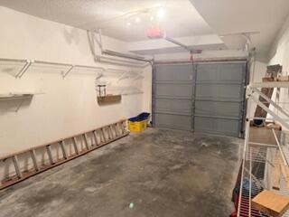 7473 Champagne Place Boca Raton, FL 33433 - Photo 24 of 27 a view of a garage