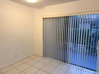 7473 Champagne Place Boca Raton, FL 33433 - Photo 4 of 27 a view of a black gate