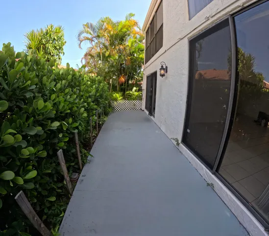 a view of a back yard of the house