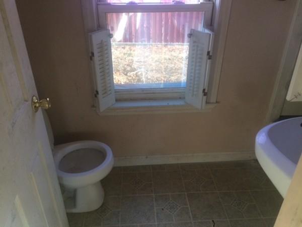 18 Salt Works Road Wareham, MA 02532 - Photo 11 of 11 a bathroom with a toilet and a window