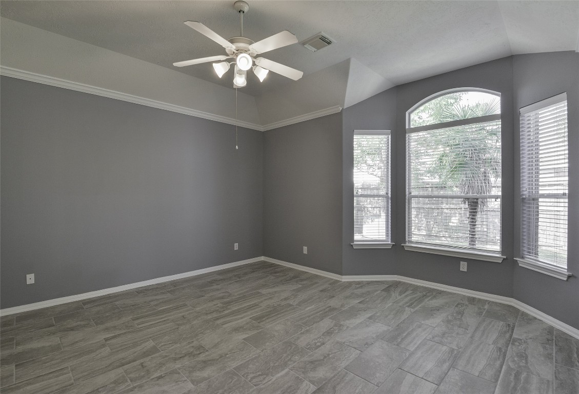 18411 Atasca Wds Trace Humble, TX 77346 - Photo 21 of 44 a view of an empty room with a window