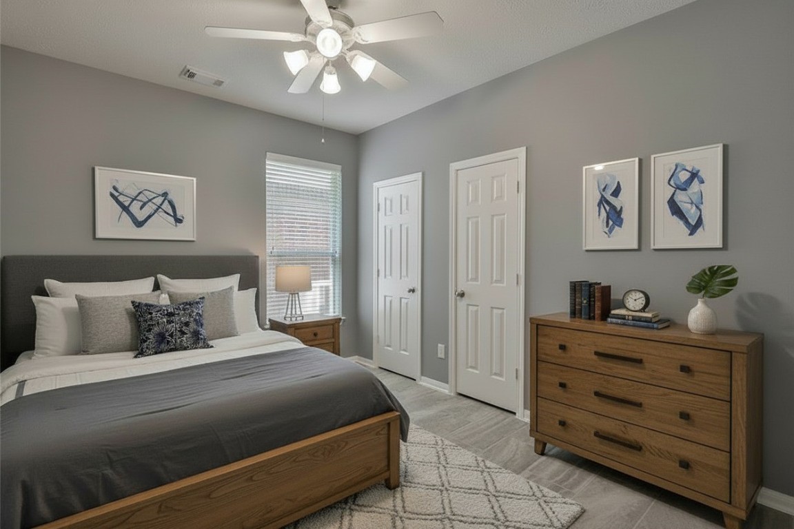 18411 Atasca Wds Trace Humble, TX 77346 - Photo 30 of 44 a bedroom with a bed and a dresser in it