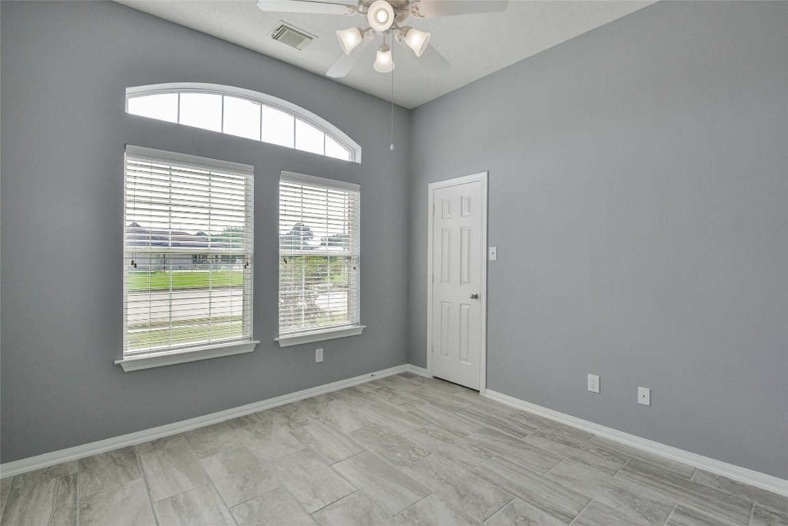 18411 Atasca Wds Trace Humble, TX 77346 - Photo 37 of 44 a view of an empty room with a window
