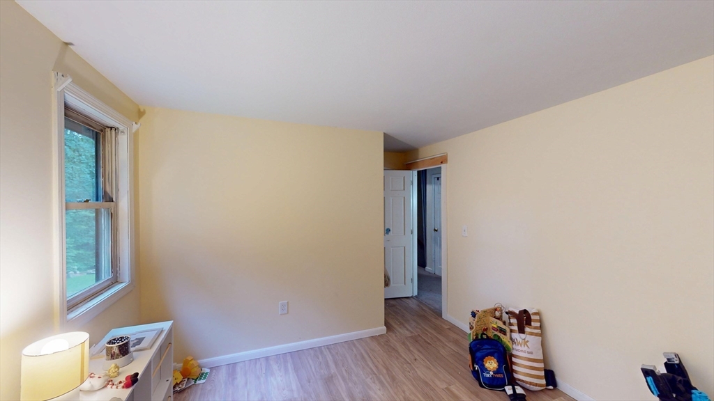 330 Arbor Street Lunenburg, MA 01462 - Photo 20 of 33 a view of room with toys and wooden floor
